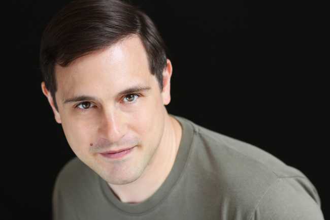 A headshot of Jason Specland